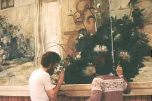 Art Zoller Wagner and Honnie Amor Wagner restoring a painting by Emilio Fernndez Alvarez, Christ Knocking at Heart's Door